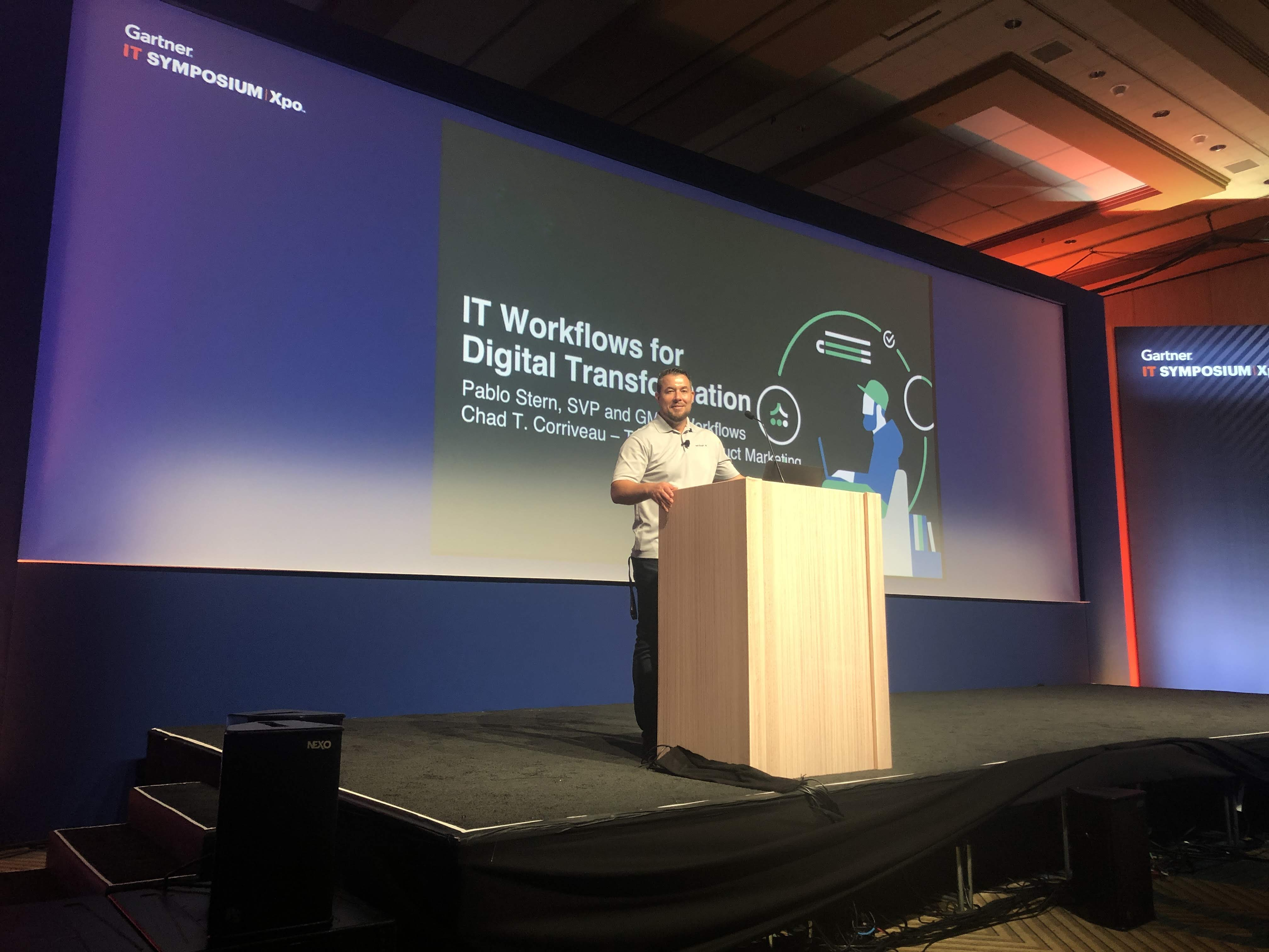 Chad Corriveau keynote speaker at Gartner IT Symposium Xpo, name on presentation slide